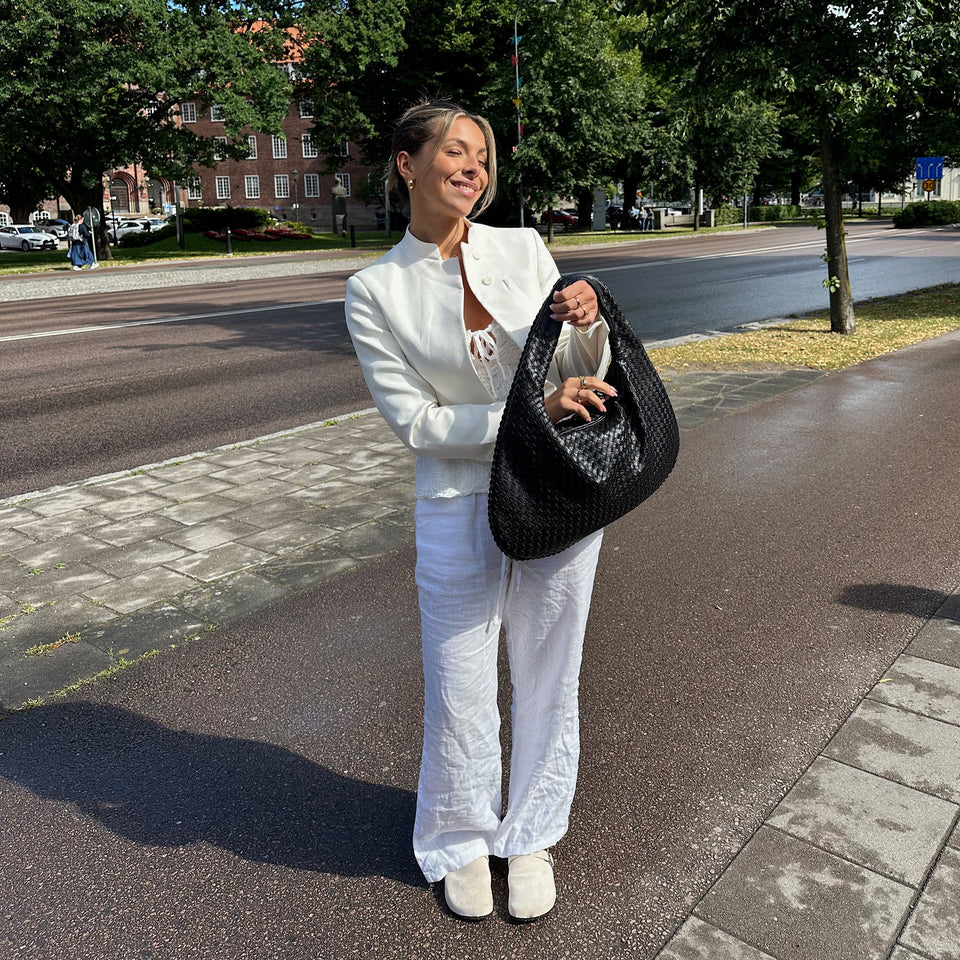 Jade - Luksuriøs flettet håndveske